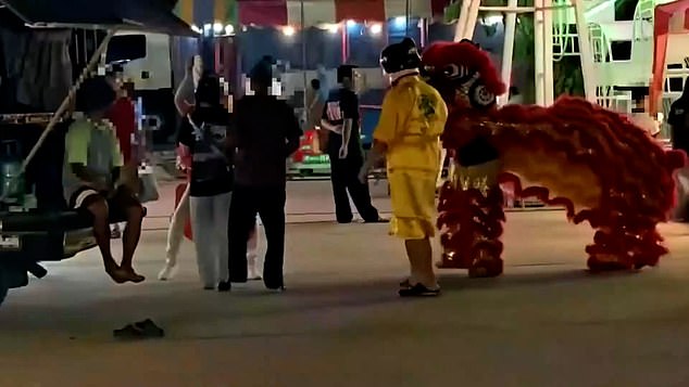 Thai Police Use Red Dragon Costume in Daring Lunar New Year Arrest of Art Theft Suspect