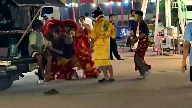 Thai Police Use Red Dragon Costume in Daring Lunar New Year Arrest of Art Theft Suspect