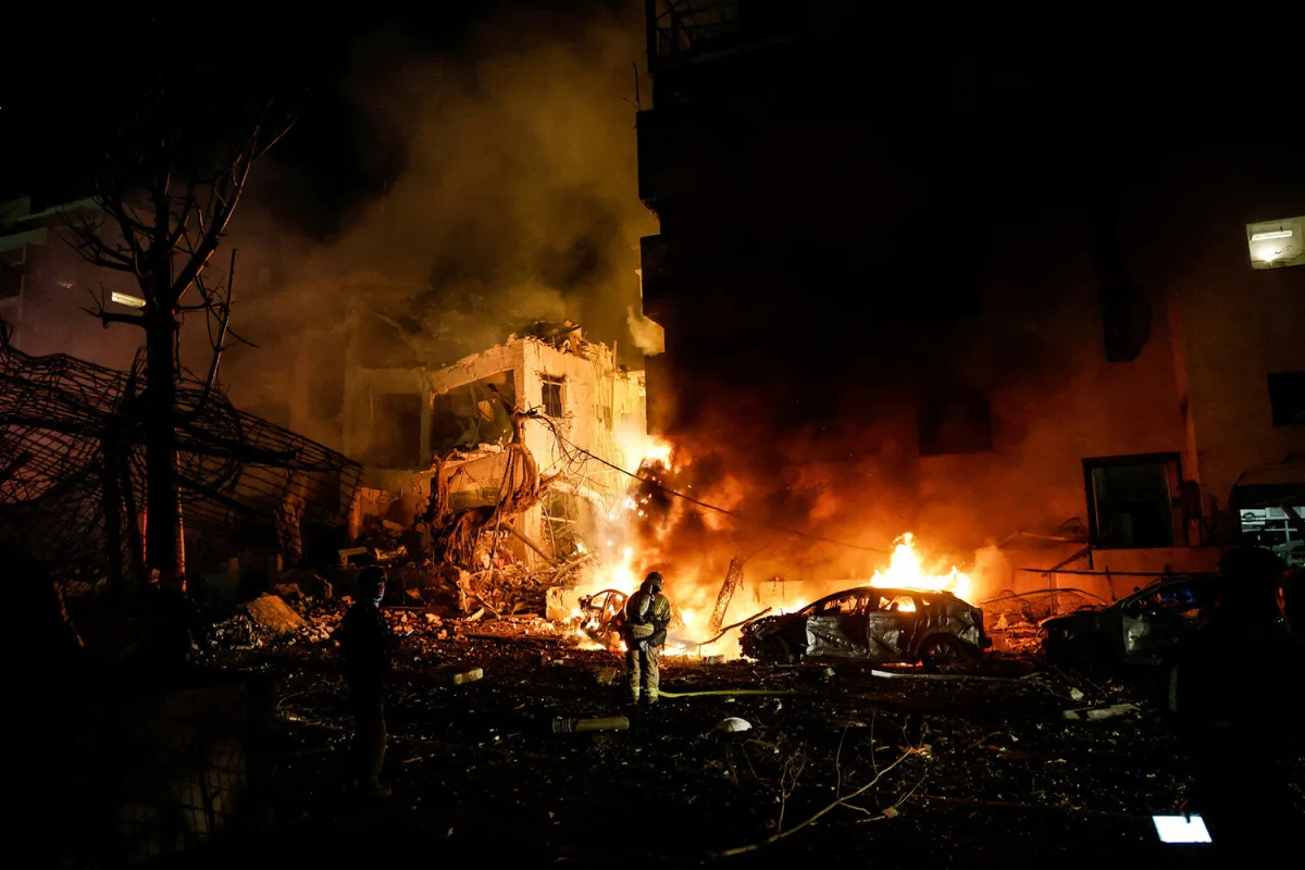 Iranian Military Escalates Hostilities with Attacks on Israeli Cities and U.S. Bases in Kuwait, Sparking Regional Tensions