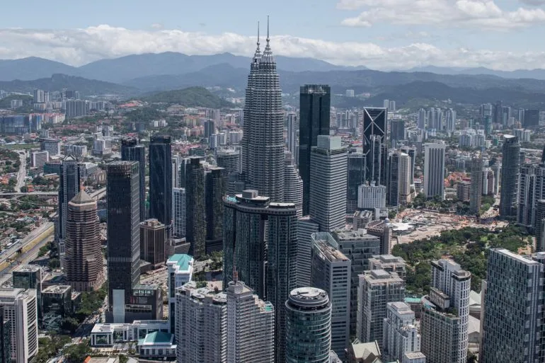 Malaysia's Visa Overhaul Targets Foreign Labor Reliance, Raising Questions for Expats