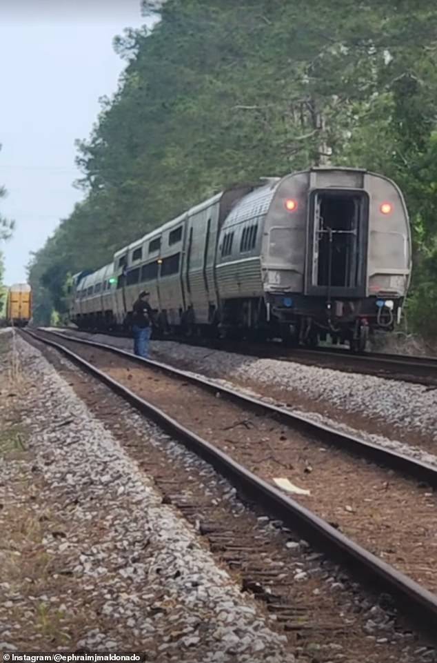 Amtrak passengers stranded 19 hours after Florida brush fire blocks tracks.