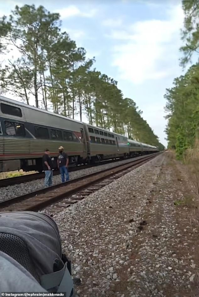 Amtrak passengers stranded 19 hours after Florida brush fire blocks tracks.