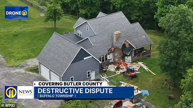 Pennsylvania man demolishes home with excavator while family escapes inside