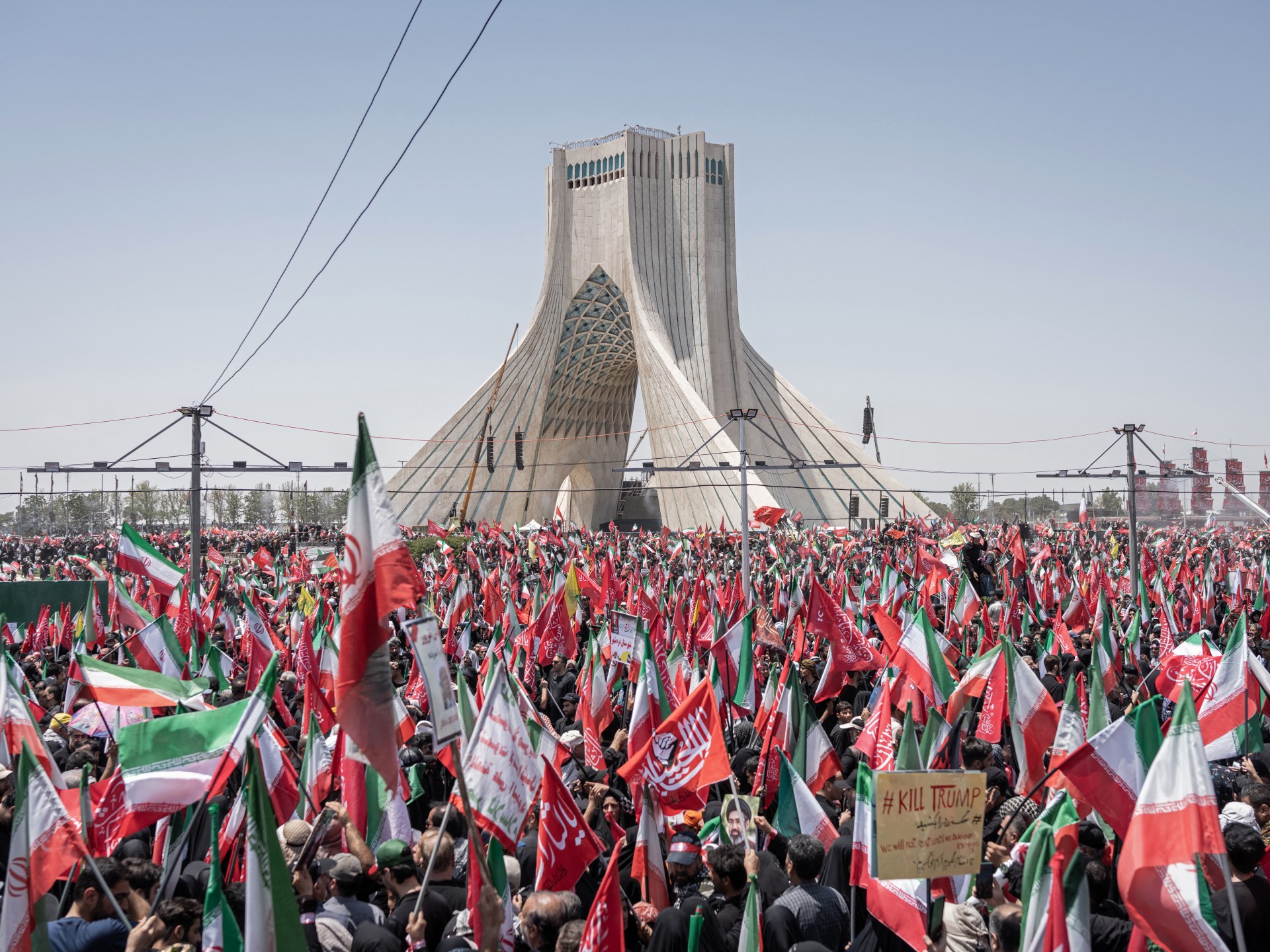 Millions mourn as Iran's Supreme Leader's remains arrive in Qom for solemn procession.
