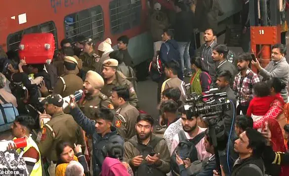 Crowds Crammed on Delayed Trains at Indian Train Station, Causing a 'Stampede' That Left at Least 15 People Dead