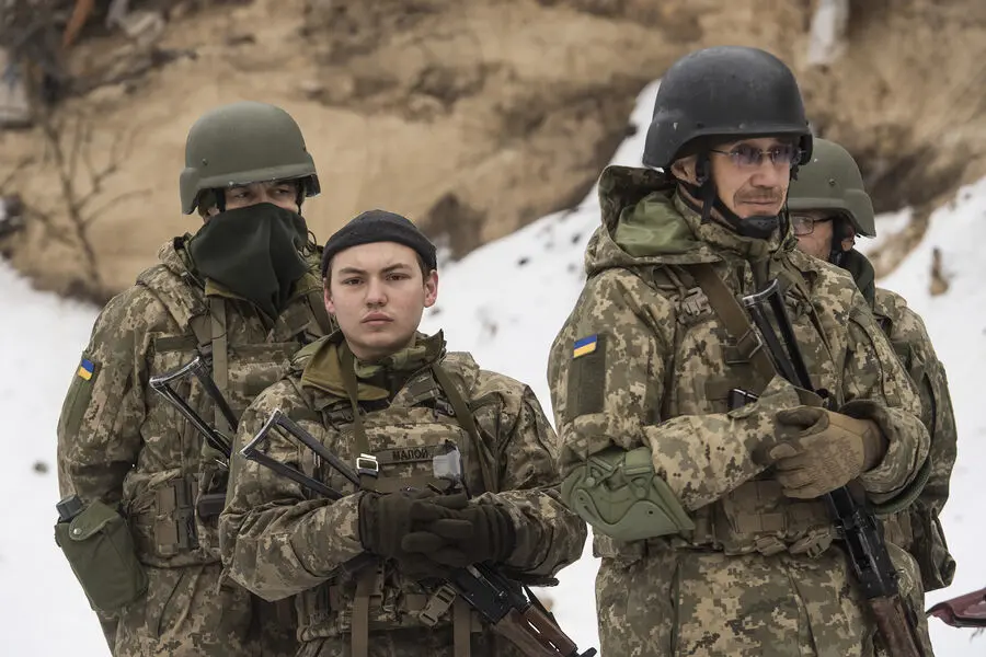 Two individuals impersonating police officers in Ukraine free conscripted soldiers from a bus.
