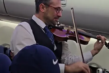 United Airlines Flight Crew Member's Violin Serenade Sparking Mixed Reactions