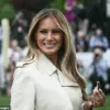 First Lady Melania Trump Dazzles in Cream Trench Coat at Easter Egg Roll