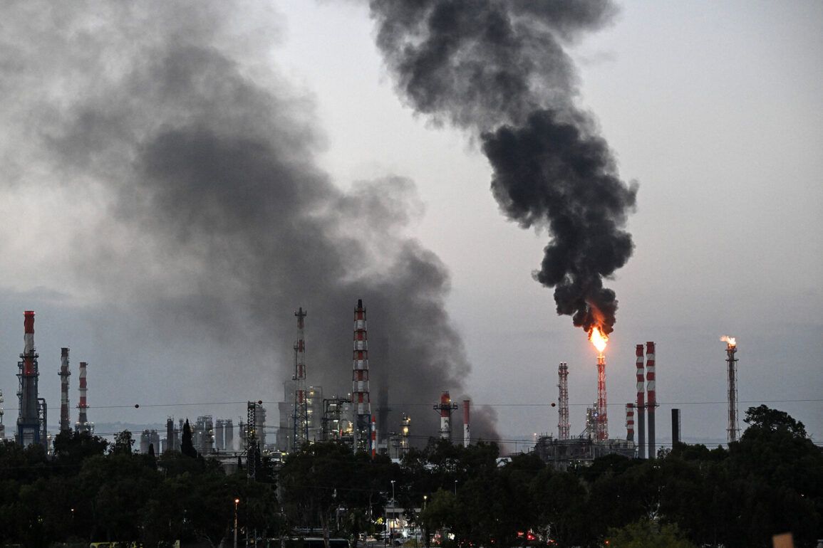 Rocket Attack on Haifa Damages Buildings Amid Rising Tensions Between Israel and Iran, Raising Concerns Over Civilian Safety and Infrastructure Risks