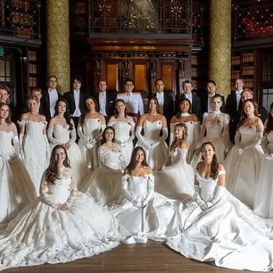 Debutantes Shine at Queen Charlotte's Ball in London: Elegant White Gowns, Diamond Jewelry, and Young Escorts